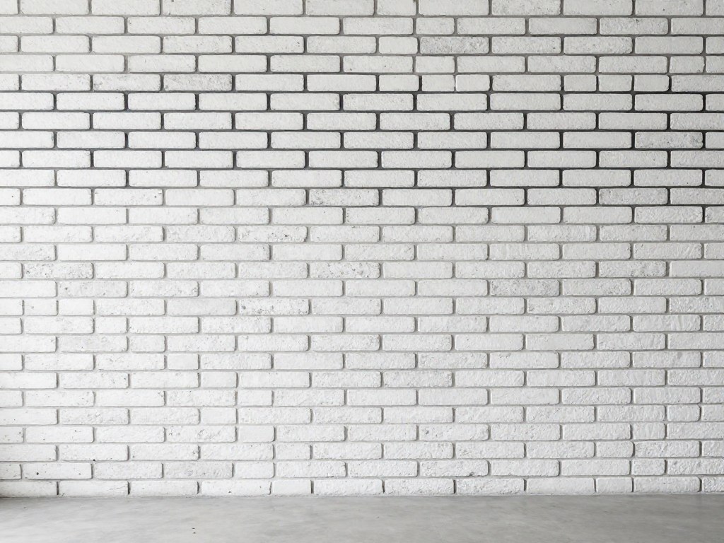 Wiązanie blokowe z białej cegły z czarną fugą